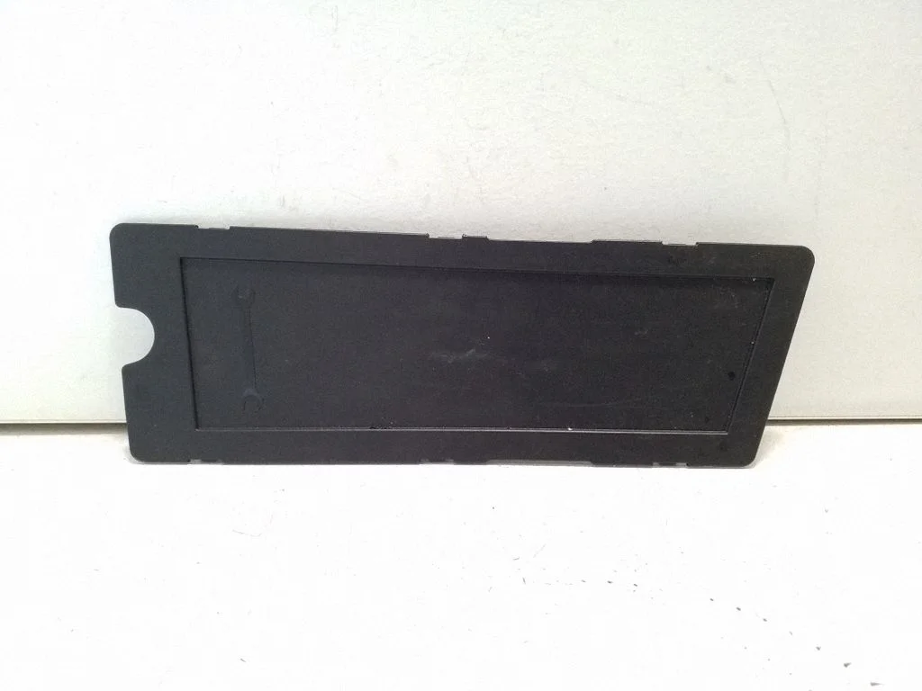 Kita bagažinės apdailos detalė