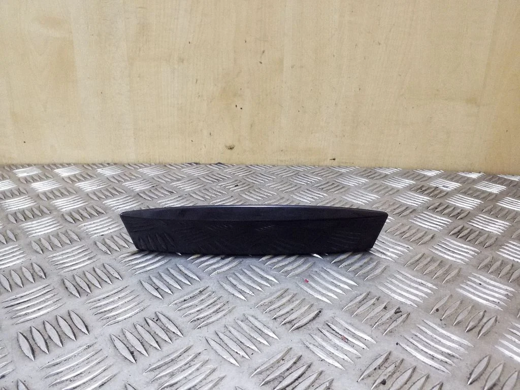 Kita bagažinės apdailos detalė