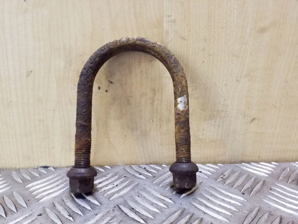 Kita galinės važiuoklės detalė